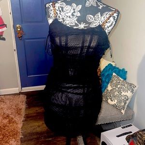 feminine and chic in our For The Night Mini Dress in Black. This fitted mini